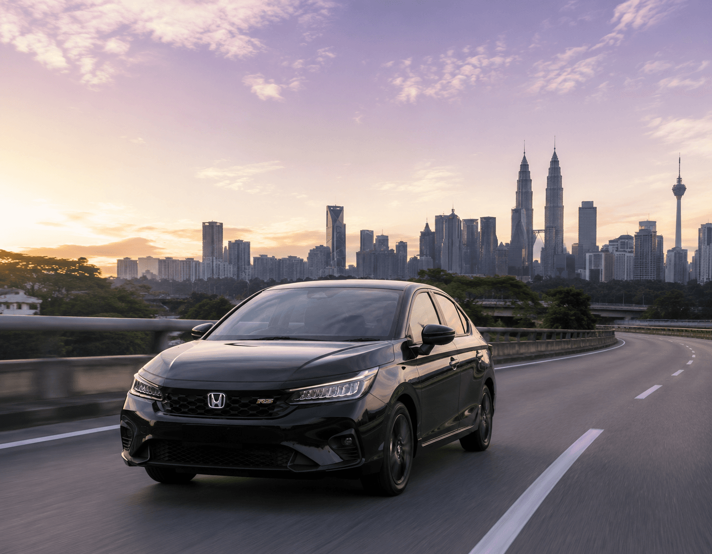 A KOI rental car on the open road toward the Kuala Lumpur skyline